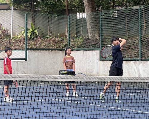 Gege's child at Junior Development Squad tennis class